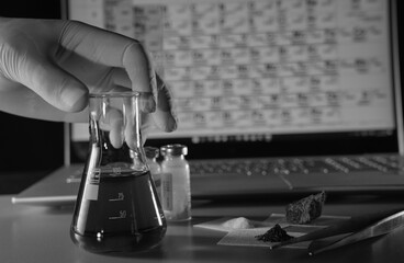 In the chemical laboratory, scientific experiments and experiments. A flask with reagent on the...