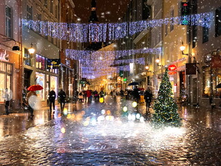 Christmas street people walking city blurring light ,blurred light people walking in the street old town Tallinn travel to Estonia.jpg