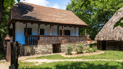 Fototapeta na wymiar Traditional Romanian clay house. Mud-brick houses