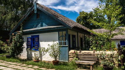 Fototapeta na wymiar Traditional Romanian clay house. Mud-brick houses