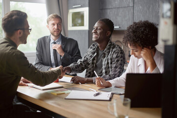business people work and conclude deals in a coworking center.