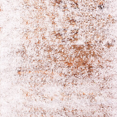 Snow on the board. Thaw on the wooden floor terrace top view. Abstrakt background.