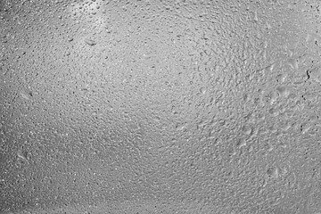 Fototapeta premium Condensation on the window. Wet surface. Raindrops.