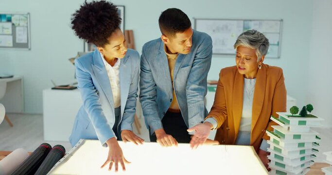 Architecture, collaboration and planning with a female leader, designer and architect working as a team in the office. Building, construction and teamwork with an engineer group at work on a project