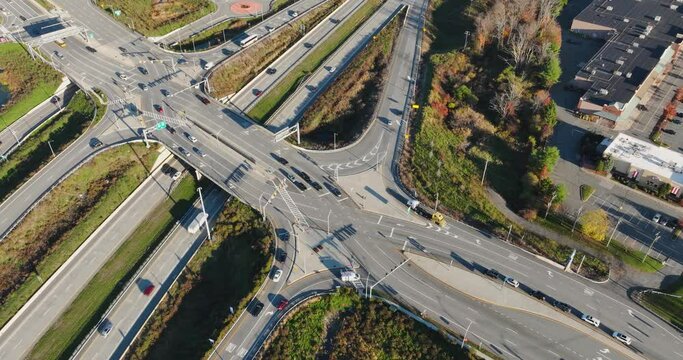 Aerial, drone, afternoon time lapse video of a diverging diamond interchange (DDI), located in Woodbury, NY.