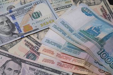 Fototapeta na wymiar Russian ruble against us dollars, banknotes close-up