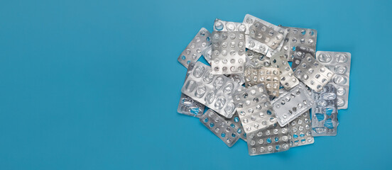 A bunch of blisters from pills. Consumption of drugs. Empty packages of medicines. Addiction