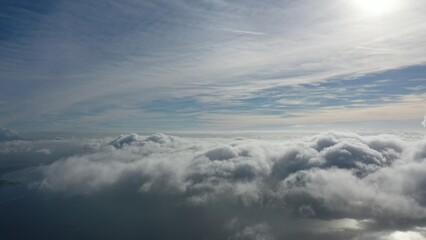 Fototapeta na wymiar aerial view above the clouds
