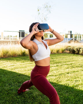 Sportswoman Training In VR Headset