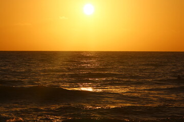 The sun sets below the horizon on the Mediterranean Sea in northern Israel.