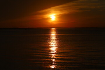 The sun sets below the horizon on the Mediterranean Sea in northern Israel.