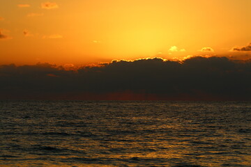 The sun sets below the horizon on the Mediterranean Sea in northern Israel.
