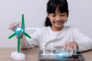 Asian little girl Works with Wind Turbine Prototype virturl, Learning about Environment and...
