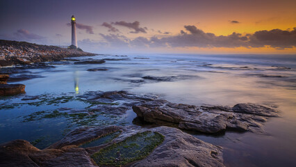 Slanghoek lighthouse reflection during a tidal change near Kommetjie