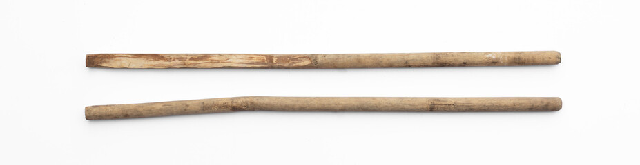 two simple wooden long stick isolated on white background