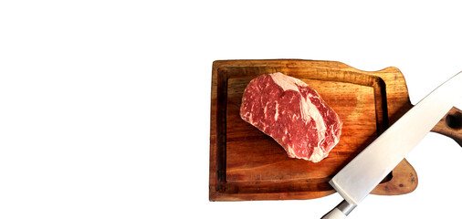 Short Rib or Costela Premium. .Beautiful raw steak under a wooden board on a wooden background. For a brazilian barbecue