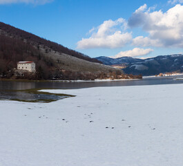 frozen lake laceno with snow