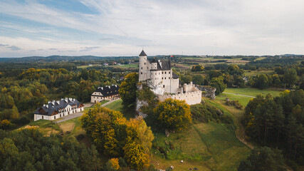 Fototapeta na wymiar Royal castle of Bobolice and Mirow castle are two very nice place to holiday trip in Poland. Slaskie Wojewodztwo have very nice landscape and nature for photography. Autumn sunsets are best. Aerial.