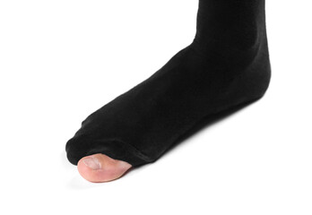 Worn sock closeup. Isolated on a white background