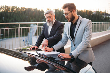 business people working outside office building