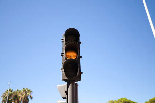 Yellow color on the traffic light.