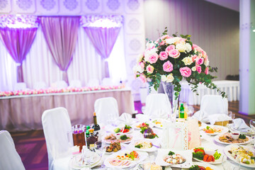 Interior of a restaurant prepared for wedding ceremony