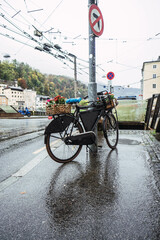 bike parked on a street lamp in salzburg