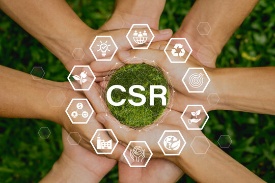 CSR(Corporate Social And Responsibility) Icon Concept In The Hands For Business And Organization.Concept To Giving Back To The Community On A Green Nature Background.