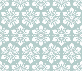 Fototapeta na wymiar Floral white ornament. Seamless abstract classic background with flowers. Light blue and white pattern with repeating floral elements. Ornament for fabric, wallpaper and packaging