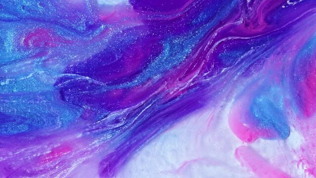 Fluid art painting video, modern acrylic texture with flowing effect. Liquid paint mixing backdrop with splash and swirl. Artistic background motion with purple, pink and blue overflowing colors.