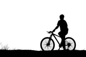 Silhouettes of mountain bikes and cyclists in the evening happily
