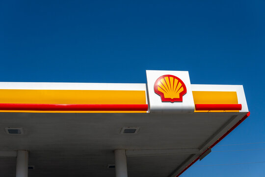 Emblem of the Royal Dutch Shell oil company against the blue sky. Everett, WA, USA - September 2022