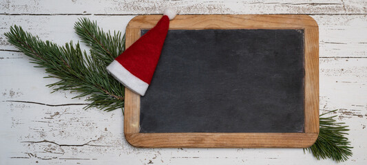 Happy St. Nicholas Day celebration holiday greeting card  - Chalkboard, pine branches and santa hat...