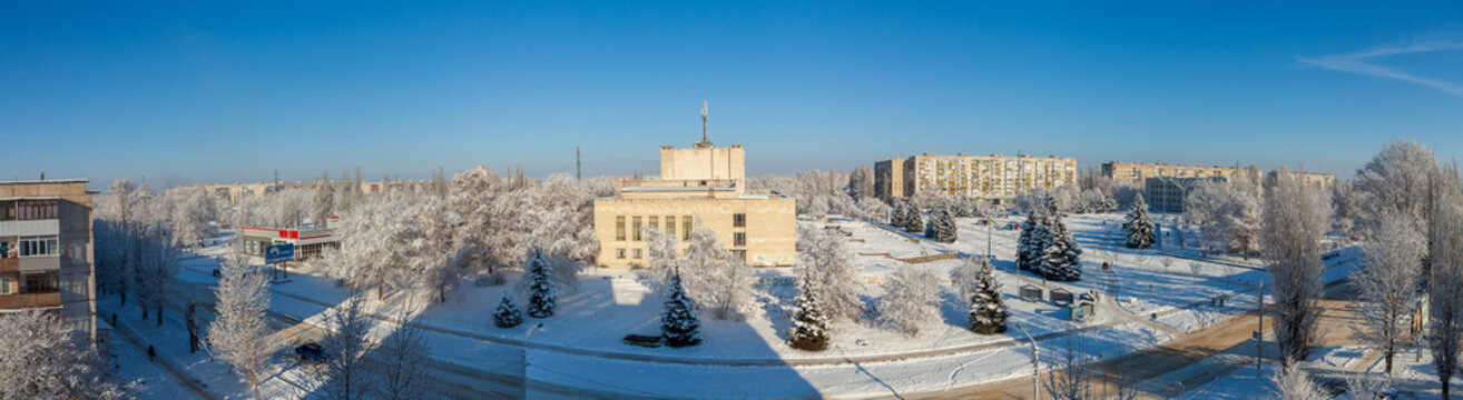 Rubizhne city, Luhansk reg. Ukraine-December,2021. Town Square on a frosty sunny winter day. View of the House of Culture and the building of the city executive committee.
