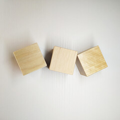 Wooden blocks 3d, toy cubes, top view. Mathematical account. Business,strategy creative material or idea template on white background