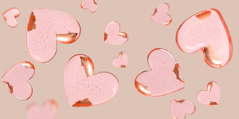 Flying heart shaped pink sweets on beige background. Valentines day greeting card. Banner.