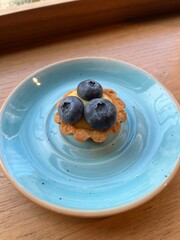 blueberry tart on a plate