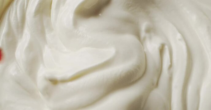 Whipped cream with strawberry syrup