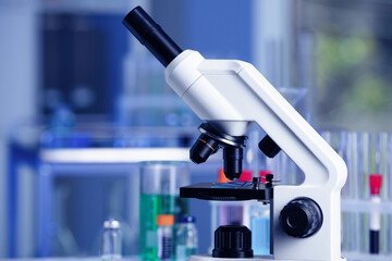 Modern medical microscope in laboratory. Space for text