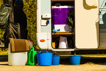 Washing laundry outdoor at caravan - obrazy, fototapety, plakaty