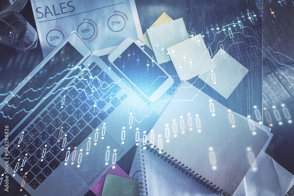 Poster financial market graph and top view computer on the desktop background. multi exposure. investment c
