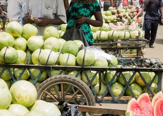Closeup of a cart with watermelons in a market