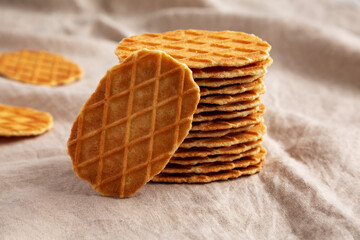 Homemade Waffle Crisps in a stack, side view. Close-up.