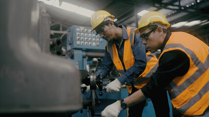 Asian workers work in factories. - 543298605