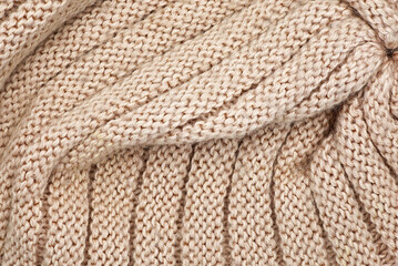 close-up of a brown knitted fabric texture background