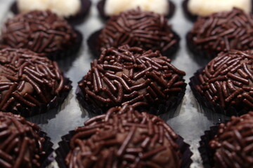 brazilian party candies, brigadeiro and beijinho. brazil traditional candies. brazilian food.