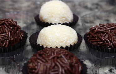 brazilian party candies, brigadeiro and beijinho. brazil traditional candies. brazilian food.