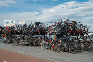 Fototapeta na wymiar Parking lot in the city center of a bicycle pile in Amsterdam the Netherlands