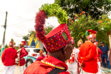 Members of the cultural event Encontro de Chegancas, in Saubara Bahia, parade through the streets...