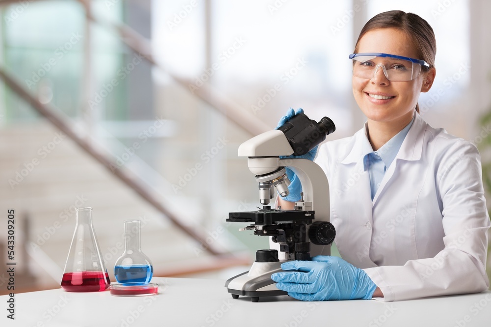 Poster scientists with microscopes working with tests in laboratory